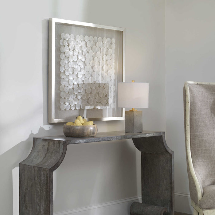The natural layered capiz shells, when lit by light, create a beautiful iridescent glow - Lifestyle Furniture
