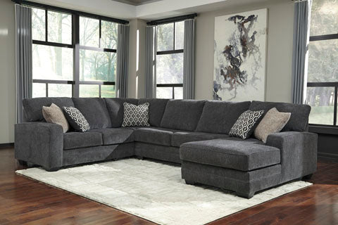 With a clean-lined, contemporary style and grey fabric upholstery, the Marina sectional sofa creates a comfortable seating zone with inviting appeal.