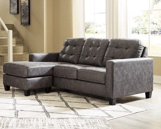 The Isla Sofa Chaise is a contemporary style sofa that can transform into a chaise lounge. Its cushions are covered in polyester, available in grey.