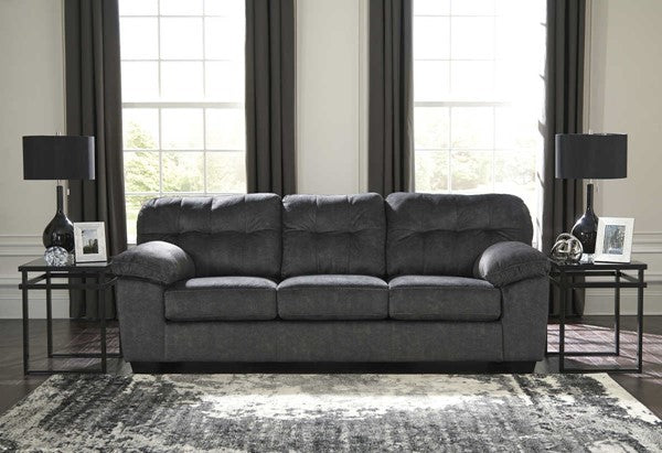 This sofa features a durable polyester fabric upholstery. It has a firm seating section and soft back cushions to provide increased comfort while sitting in it. - Lifestyle Furniture