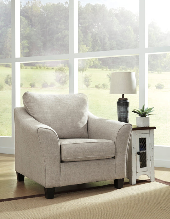 The clean and modern styling of the sofa has beautiful trim to add a nice contrast to the white fabric covering. The plush cushions are removed easily for cleaning or simple re- fluffing.