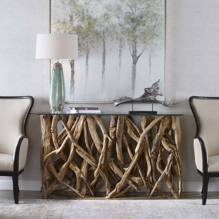 Natural and raw, teak wood has been crafted from its natural form into this artistic and precisely honed sculpture beneath clear glass - Lifestyle Furniture
