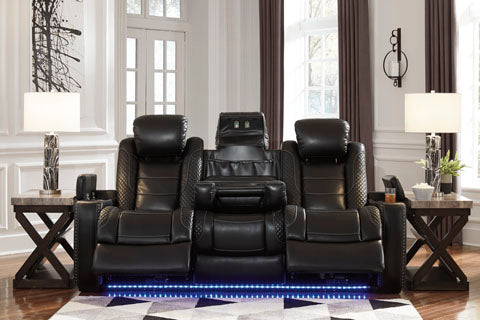 This black-finished reclining sectional has high-resiliency foam cushions with black faux leather upholstery, cross-hatch stitching and a manual reclining function with an infinite recline - Lifestyle Furniture