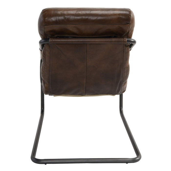 The industrial tube iron legs coupled with the leather upholstery give this chair an urban appeal, making it a perfect choice for ultra-modern interiors - Lifestyle Furniture