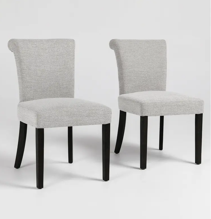 grey tone upholstered dining chair with curved back and black legs - Lifestyle Furniture