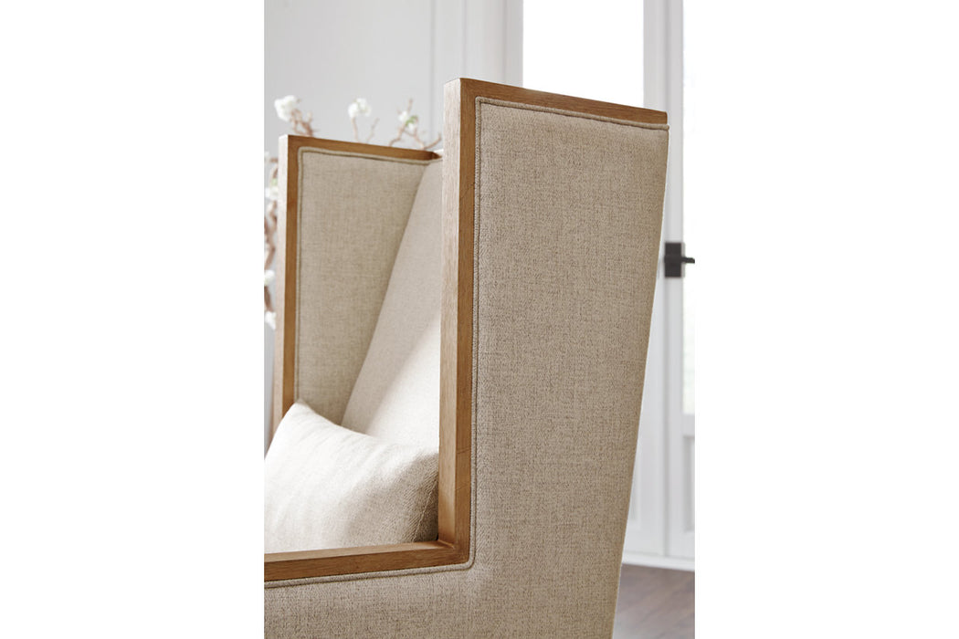 This chair features beige linen-colored fabric, a lumbar pillow, and wood frame -Lifestyle Furniture
