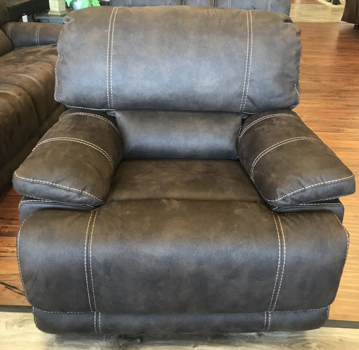This contemporary grey recliner provides a touch of comfort to any entryway, living room, or home cinema with its gentle curves.