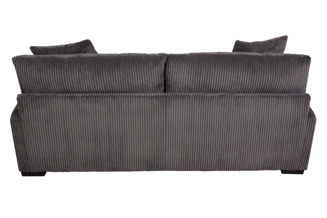 The Big Chill Sofa features a modern style and color. It is made from durable microfiber material that easily wipes clean.