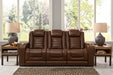 This classically styled recliner with power recline and extension footrest is extremely versatile.