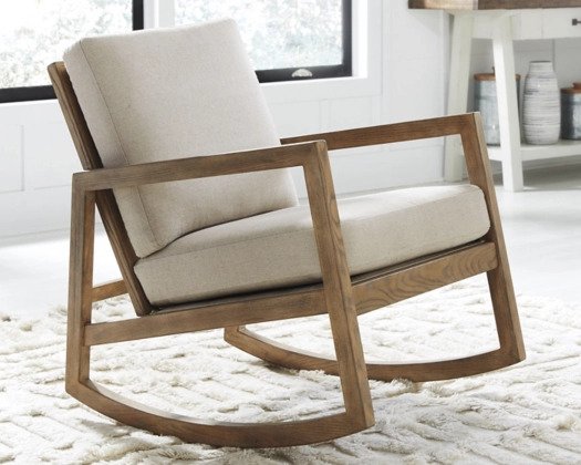  Neutrally-toned fabric covers its light wood rocking chair frame. It’s a worthy addition to living rooms, bedrooms—even reading nooks - Lifestyle Furniture