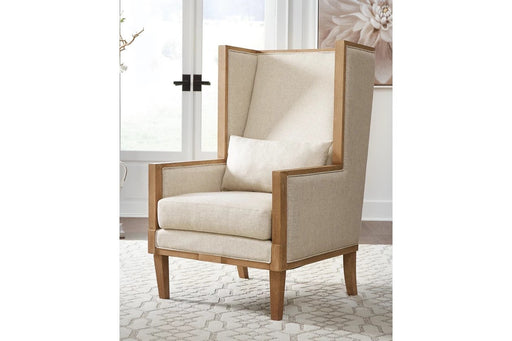 Featuring an elegant lumbar pillow to help cradle your back for added support, it sits on gracefully tapered wood legs that come in a light brown finish - Lifestyle Furniture