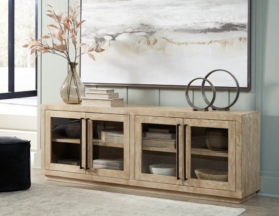 Give your home a sleek modern touch with the Belenburg Accent Cabinet. With mirrored doors, this accent cabinet creates the illusion of a larger space.