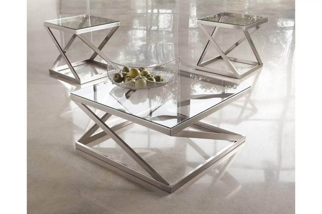 This set includes a cocktail table, end table , each with an attractive glass top. The unique crisscross legs feature a gold-tone finish for an elegant contrast against the darker tabletop.