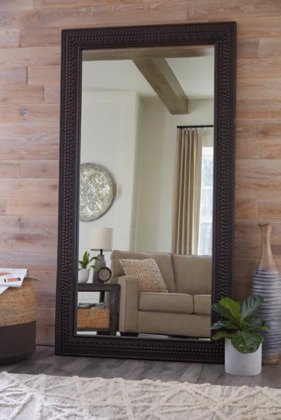 This floor mirror was crafted with you in mind. Brighten any room with its wide angle and make sure you look your best.