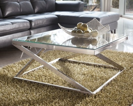 It is the perfect blend of function and style with durable metal frames, tempered glass tops, and ample display space allowing it to effortlessly fit within your home's existing décor.