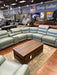 This sectional is a fantastic addition to any modern space. Its clean lines and soft, grey upholstery make it easy to coordinate with any decor.