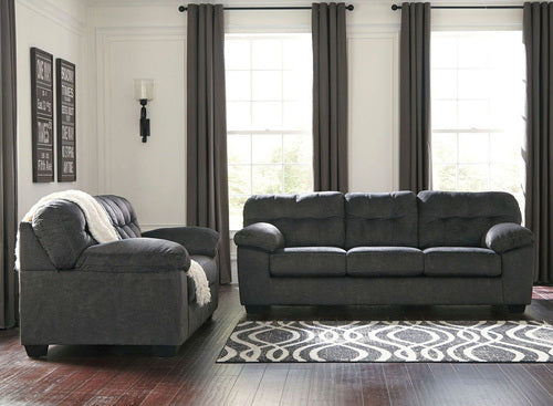 This set includes a loveseat, sofa and recliner and is made from one hundred percent polyester in a dark grey color.  - Lifestyle Furniture