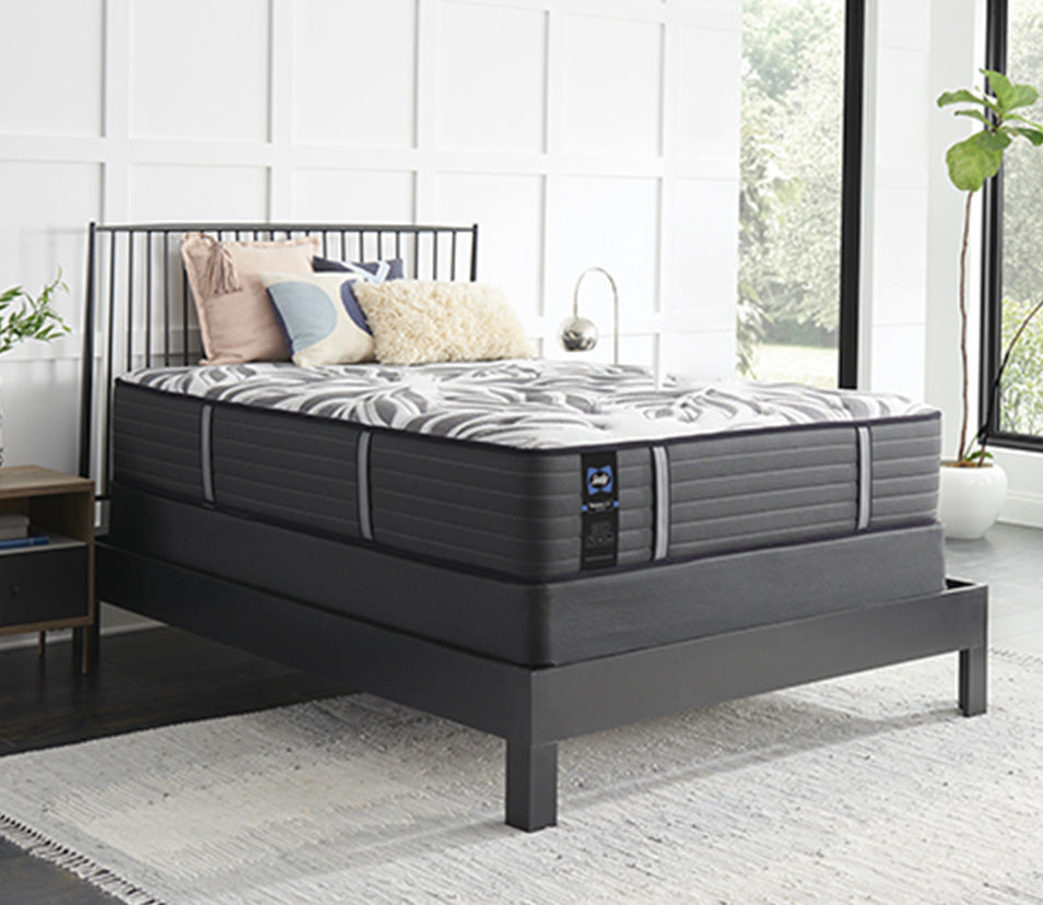 Queen size EPT Sealy Posturepedic® mattress in styled bedroom